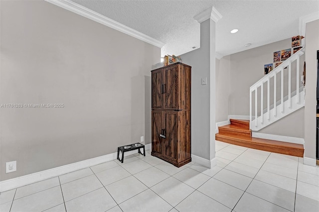 772 NW 132nd Ave, Plantation, FL 33325 - staircase featuring tile patterned floors, baseboards, a textured ceiling, and ornamental molding