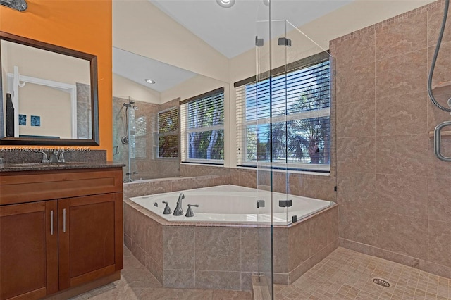 772 NW 132nd Ave, Plantation, FL 33325 - bathroom featuring vanity, a shower stall, a garden tub, and lofted ceiling