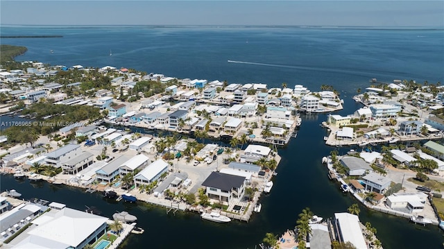 aerial view with a water view and a residential view