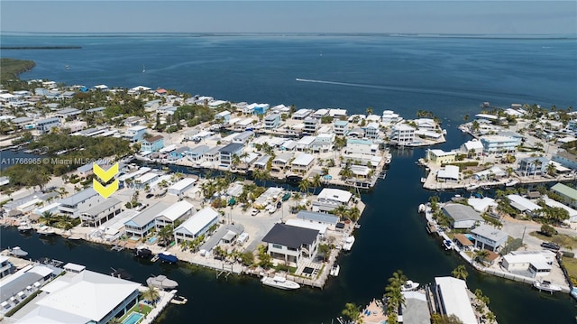 birds eye view of property featuring a residential view and a water view