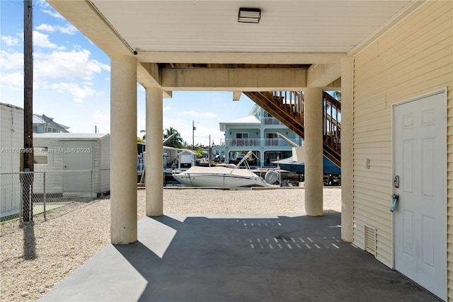 view of patio featuring fence