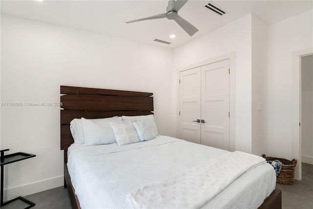 bedroom with a closet, visible vents, recessed lighting, and baseboards