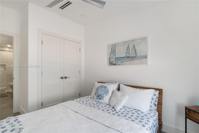 bedroom featuring a closet, visible vents, and ceiling fan