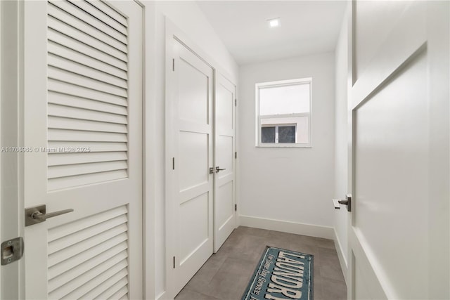 doorway with baseboards