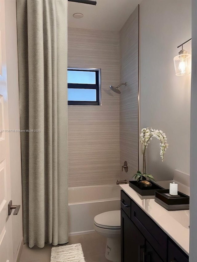 full bathroom with shower / bathtub combination with curtain, vanity, and toilet