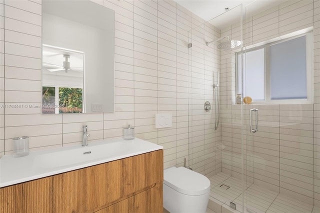 1040 NE 85th St, Miami, FL 33138 - full bathroom featuring tile walls, a shower stall, toilet, vanity, and ceiling fan
