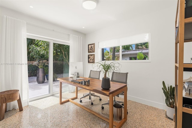 1040 NE 85th St, Miami, FL 33138 - office featuring speckled floor, baseboards, and recessed lighting