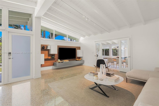1040 NE 85th St, Miami, FL 33138 - living area featuring speckle patterned floor, baseboards, beam ceiling, high vaulted ceiling, and wooden ceiling