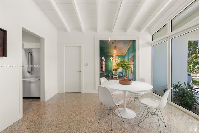 1040 NE 85th St, Miami, FL 33138 - dining area with speckled floor, beam ceiling, baseboards, wooden ceiling, and a chandelier