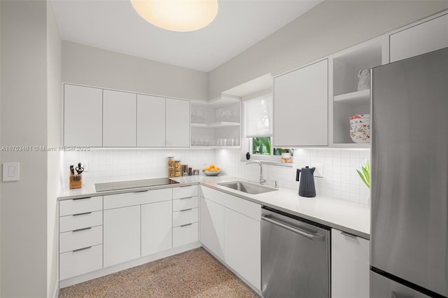 1040 NE 85th St, Miami, FL 33138 - kitchen with open shelves, appliances with stainless steel finishes, a sink, modern cabinets, and tasteful backsplash
