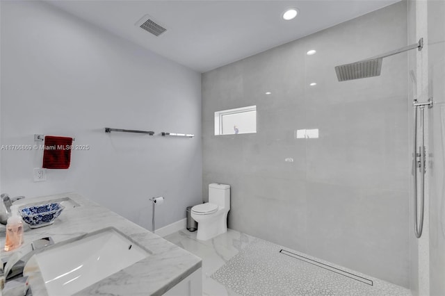 full bathroom with visible vents, a sink, a shower, toilet, and marble finish floor