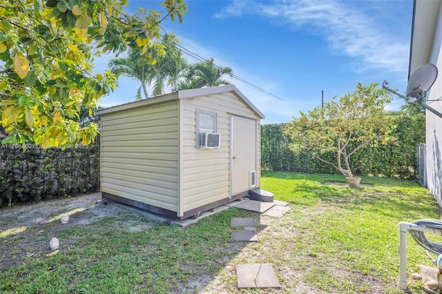 view of shed featuring a fenced backyard