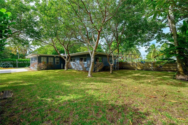 view of yard with fence