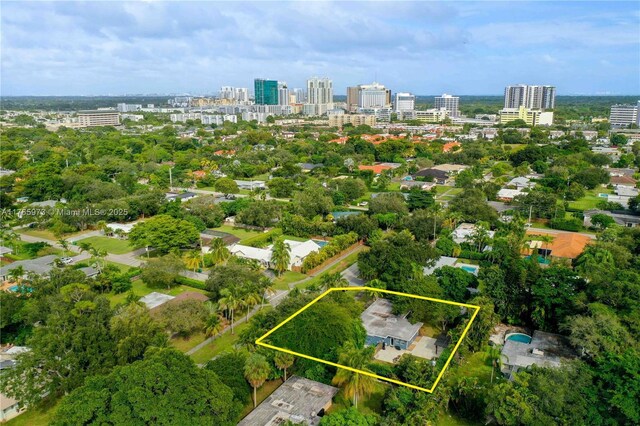 birds eye view of property featuring a view of city