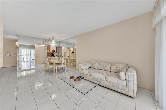 unfurnished living room with an inviting chandelier and light tile patterned floors