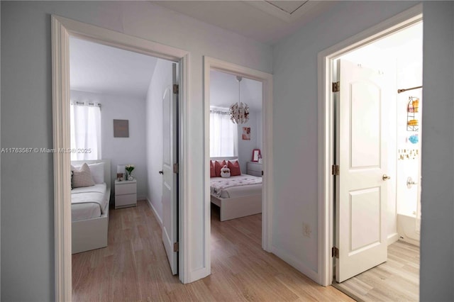 14016 SW 160th St, Miami, FL 33177 - corridor featuring light wood-style floors and baseboards