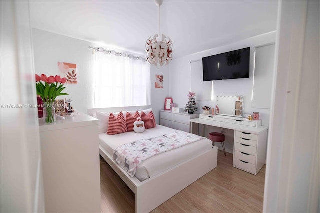 14016 SW 160th St, Miami, FL 33177 - bedroom with a notable chandelier and light wood finished floors