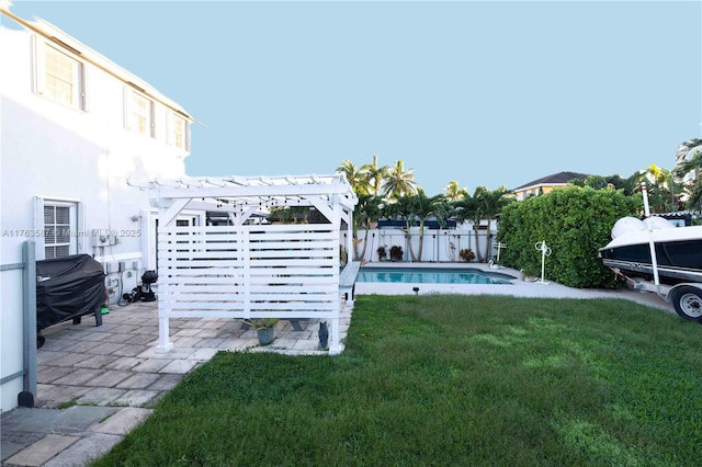 14016 SW 160th St, Miami, FL 33177 - view of yard with a fenced in pool, a patio, a fenced backyard, and a pergola