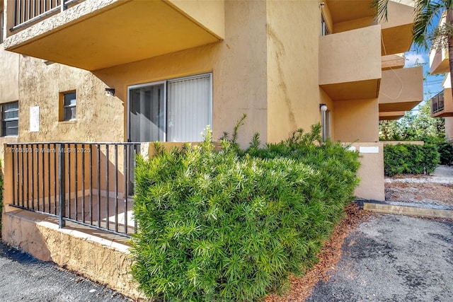 exterior space with stucco siding
