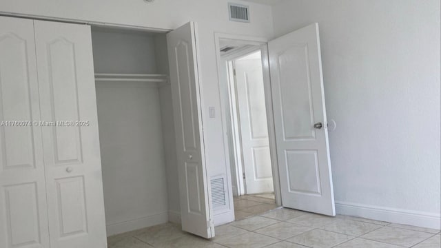 5102 NW 79th Ave Unit 304, Doral, FL 33166 - closet featuring visible vents