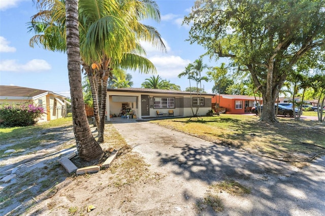2813 SW 67th Ln, Miramar, FL 33023 - single story home with stucco siding, a front yard, and driveway
