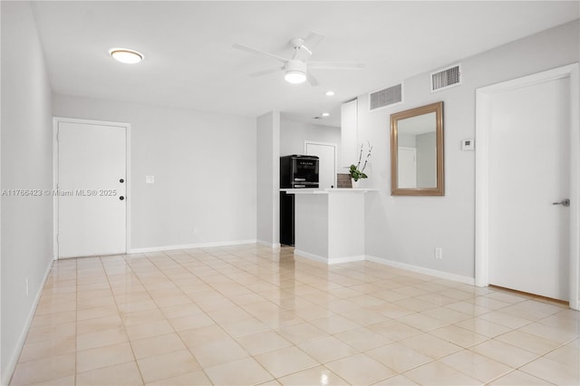 3040 NE 16th Ave Unit 104, Oakland Park, FL 33334 - unfurnished living room with ceiling fan, baseboards, recessed lighting, and light tile patterned floors