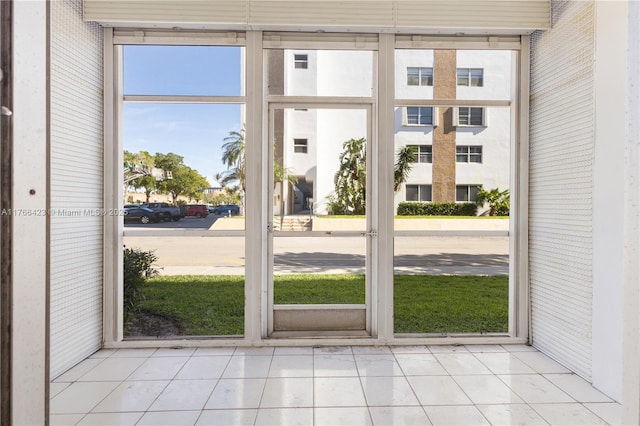 3040 NE 16th Ave Unit 104, Oakland Park, FL 33334 - doorway featuring tile patterned flooring