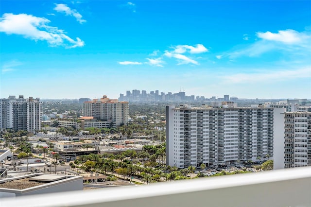 birds eye view of property featuring a city view