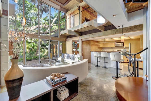 2410 SW 29th Way, Fort Lauderdale, FL 33312 - living room with finished concrete floors