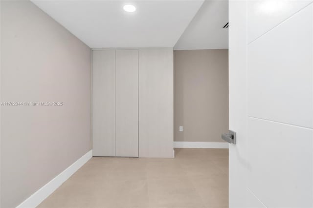 5255 Collins Ave Unit 9B, Miami Beach, FL 33140 - unfurnished room featuring baseboards and recessed lighting