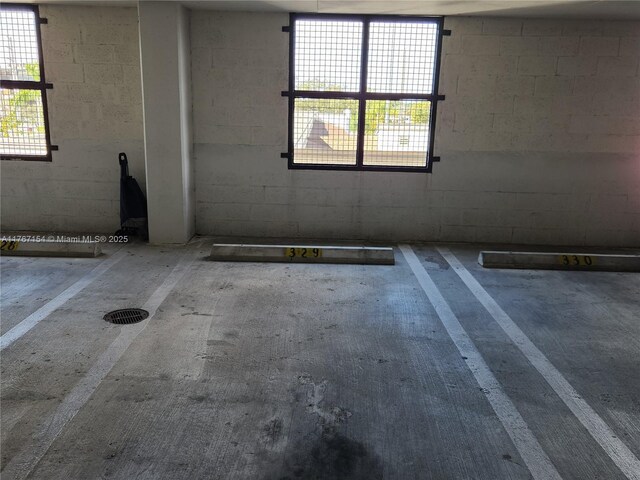 4242 NW 2nd St Unit 1202, Miami, FL 33126 - empty room with concrete block wall