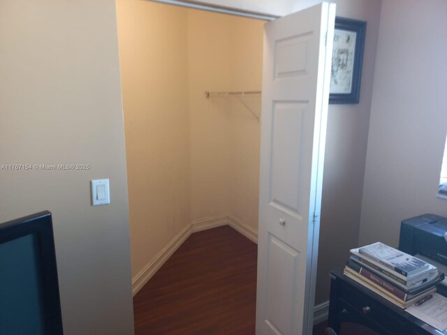 4242 NW 2nd St Unit 1202, Miami, FL 33126 - interior space featuring dark wood-style flooring