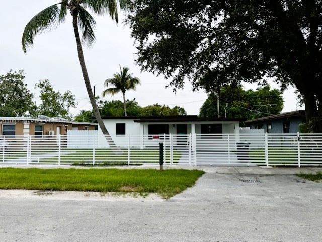11730 NW 3rd Ave, Miami, FL 33168 - view of front of property featuring fence