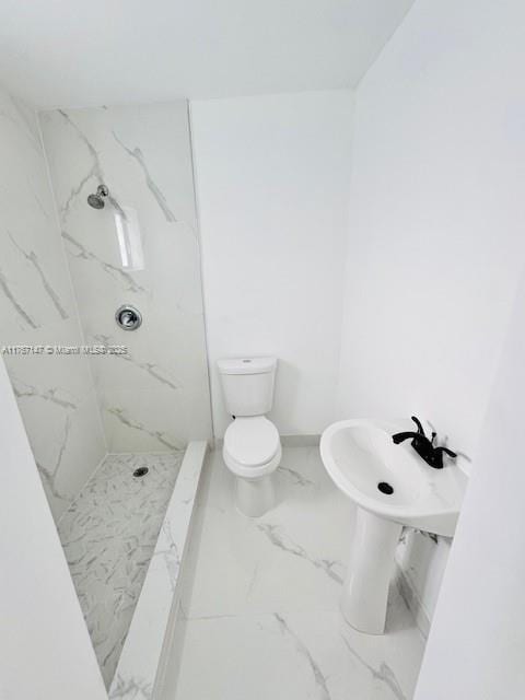 11730 NW 3rd Ave, Miami, FL 33168 - bathroom with toilet, marble finish floor, and a marble finish shower