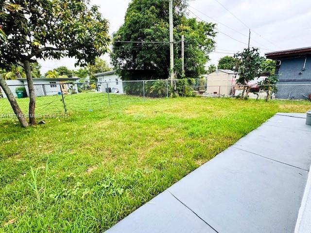 11730 NW 3rd Ave, Miami, FL 33168 - view of yard featuring fence