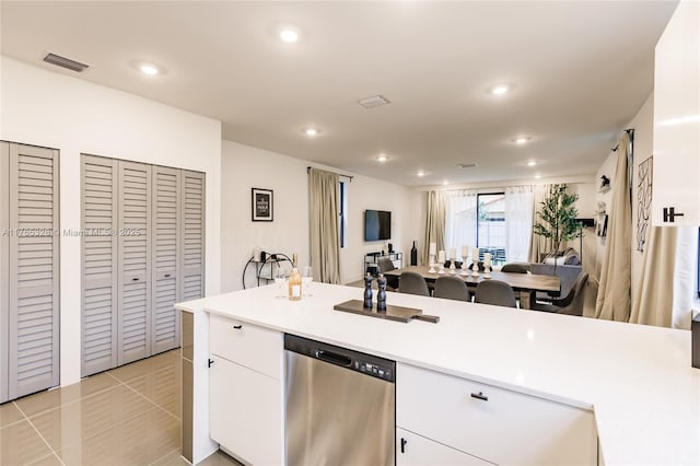 kitchen with light countertops, visible vents, dishwasher, recessed lighting, and white cabinetry