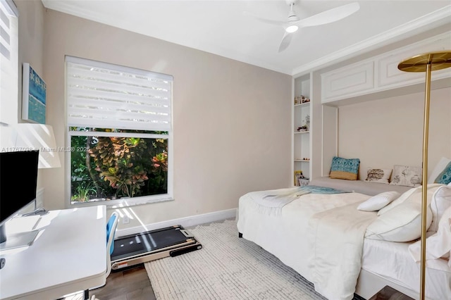 bedroom featuring baseboards, a ceiling fan, and crown molding