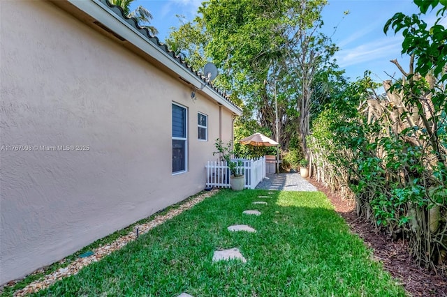 view of yard featuring fence