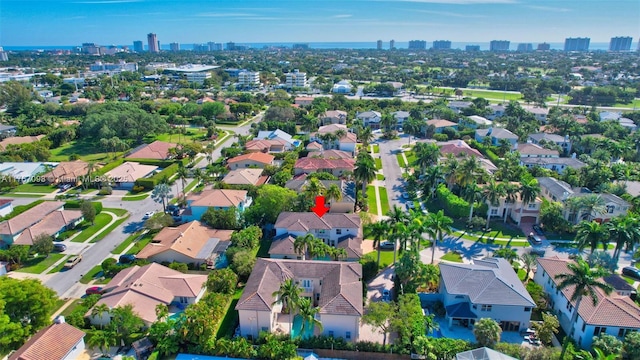 birds eye view of property with a residential view