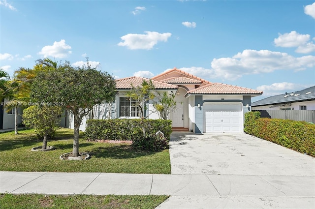 18234 SW 143rd Pl, Miami, FL 33177 - mediterranean / spanish-style house with concrete driveway, a tile roof, a front yard, stucco siding, and a garage