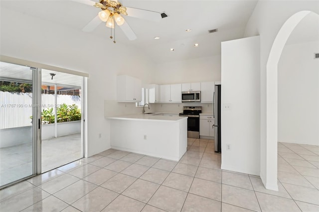 18234 SW 143rd Pl, Miami, FL 33177 - kitchen featuring visible vents, a sink, a peninsula, appliances with stainless steel finishes, and light tile patterned flooring