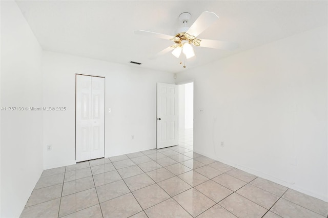 18234 SW 143rd Pl, Miami, FL 33177 - empty room featuring light tile patterned flooring, visible vents, and ceiling fan