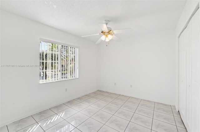 18234 SW 143rd Pl, Miami, FL 33177 - empty room featuring a textured ceiling and ceiling fan