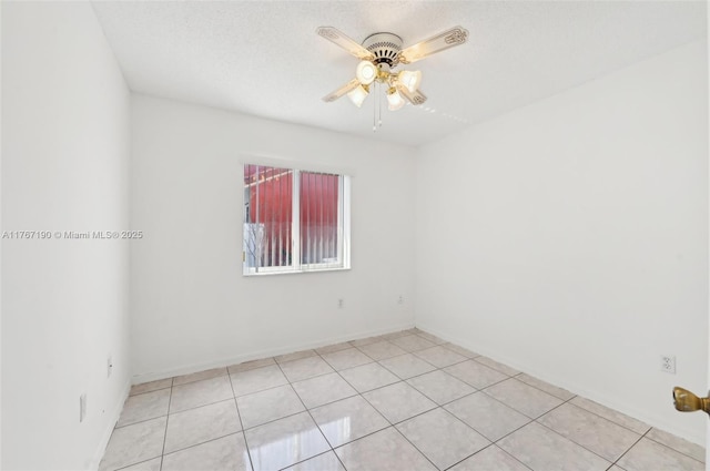 18234 SW 143rd Pl, Miami, FL 33177 - spare room with light tile patterned floors, a ceiling fan, and a textured ceiling