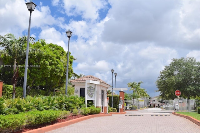 17347 NW 7th Ave Unit 907, Miami Gardens, FL 33169 - view of community featuring fence and a gate
