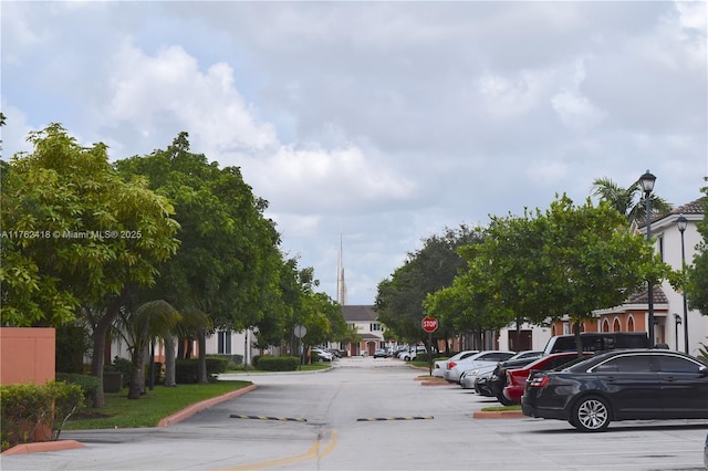 17347 NW 7th Ave Unit 907, Miami Gardens, FL 33169 - view of street featuring a residential view, street lighting, and traffic signs