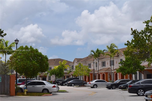 17347 NW 7th Ave Unit 907, Miami Gardens, FL 33169 - view of vehicle parking featuring a residential view