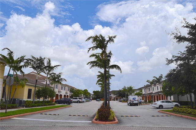 17347 NW 7th Ave Unit 907, Miami Gardens, FL 33169 - view of street with curbs, a residential view, and sidewalks