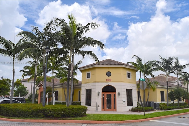 17347 NW 7th Ave Unit 907, Miami Gardens, FL 33169 - view of building exterior with central AC unit