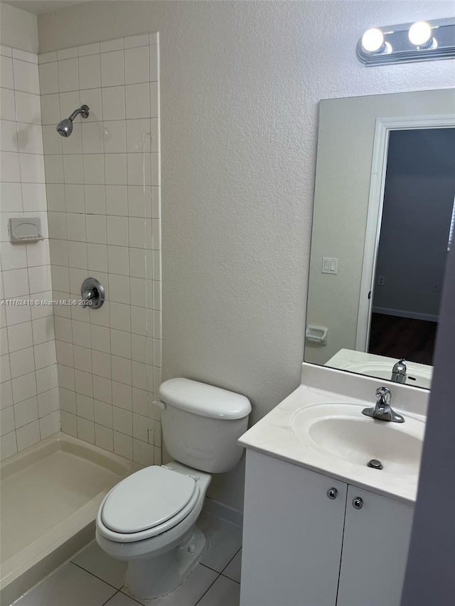 17347 NW 7th Ave Unit 907, Miami Gardens, FL 33169 - full bath with tile patterned floors, a tile shower, and toilet